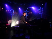 Lionel Ritchie on stage at a private party with lighting and sound